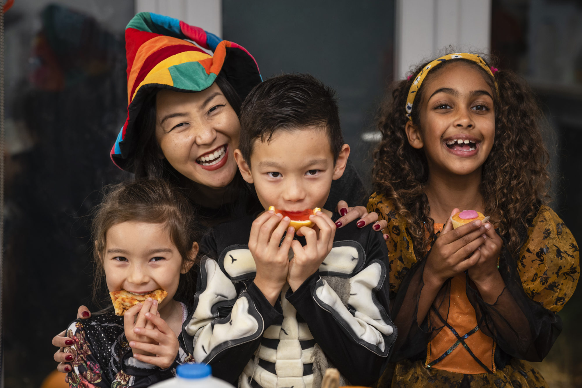 Children eating snacks and in costumes.